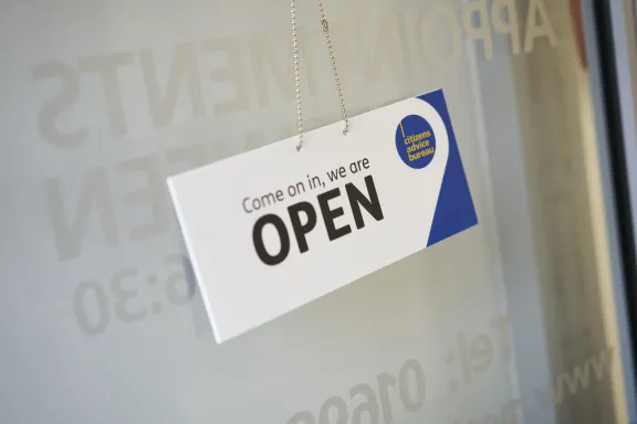 Image of an open sign on a door