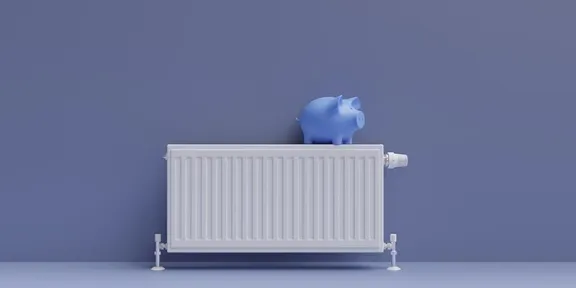Piggybank on a radiator in a cold looking room